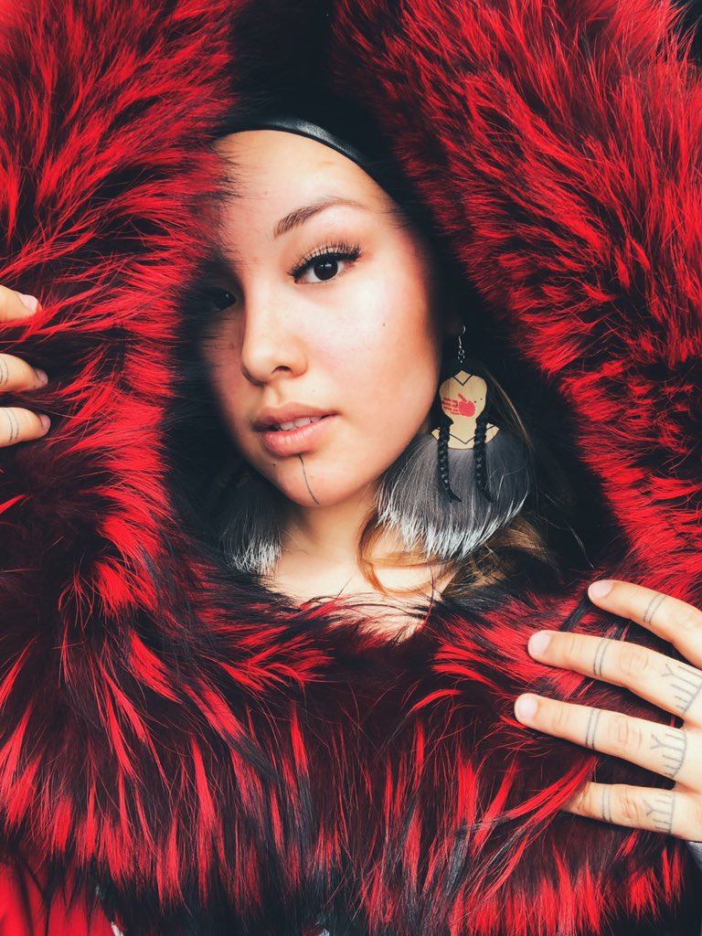 Today is the National Day of Awareness for Missing and Murdered Indigenous Women and Girls. “Please recognize and honour them,” writes Nathalia Okalik of Iqaluit, who posted this image of herself with a red amauti. Red dresses have become a symbol of missing and murdered Indigenous women and girls. “Pray for them, as well as their loved ones.” (Photo courtesy of Nathalia Okalik)