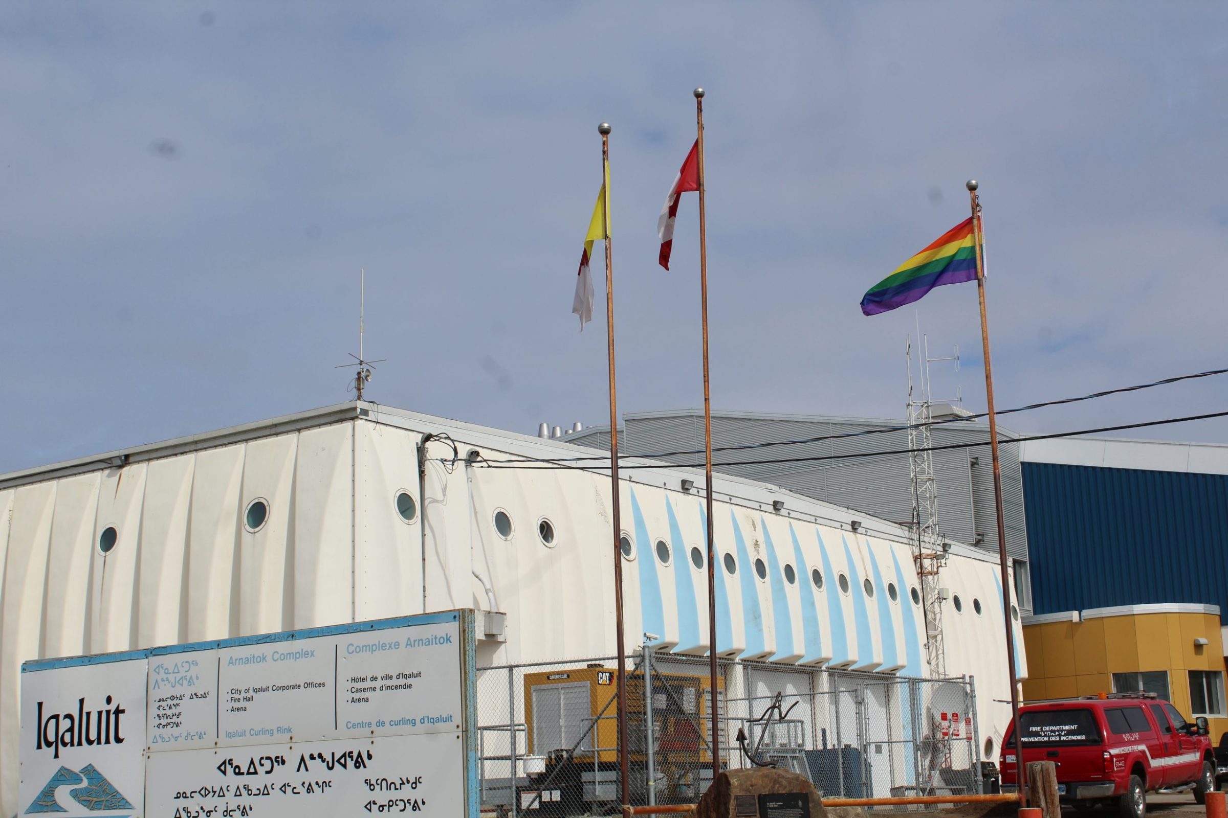 The pride flag will now fly at Iqaluit city hall for one week every June after a unanimous vote during last night’s city council meeting. In the past, as was the case last night in a motion brought forward by Coun. Kyle Sheppard, the raising of the flag needed to be voted on every year by council. (Photo by Meagan Deuling)