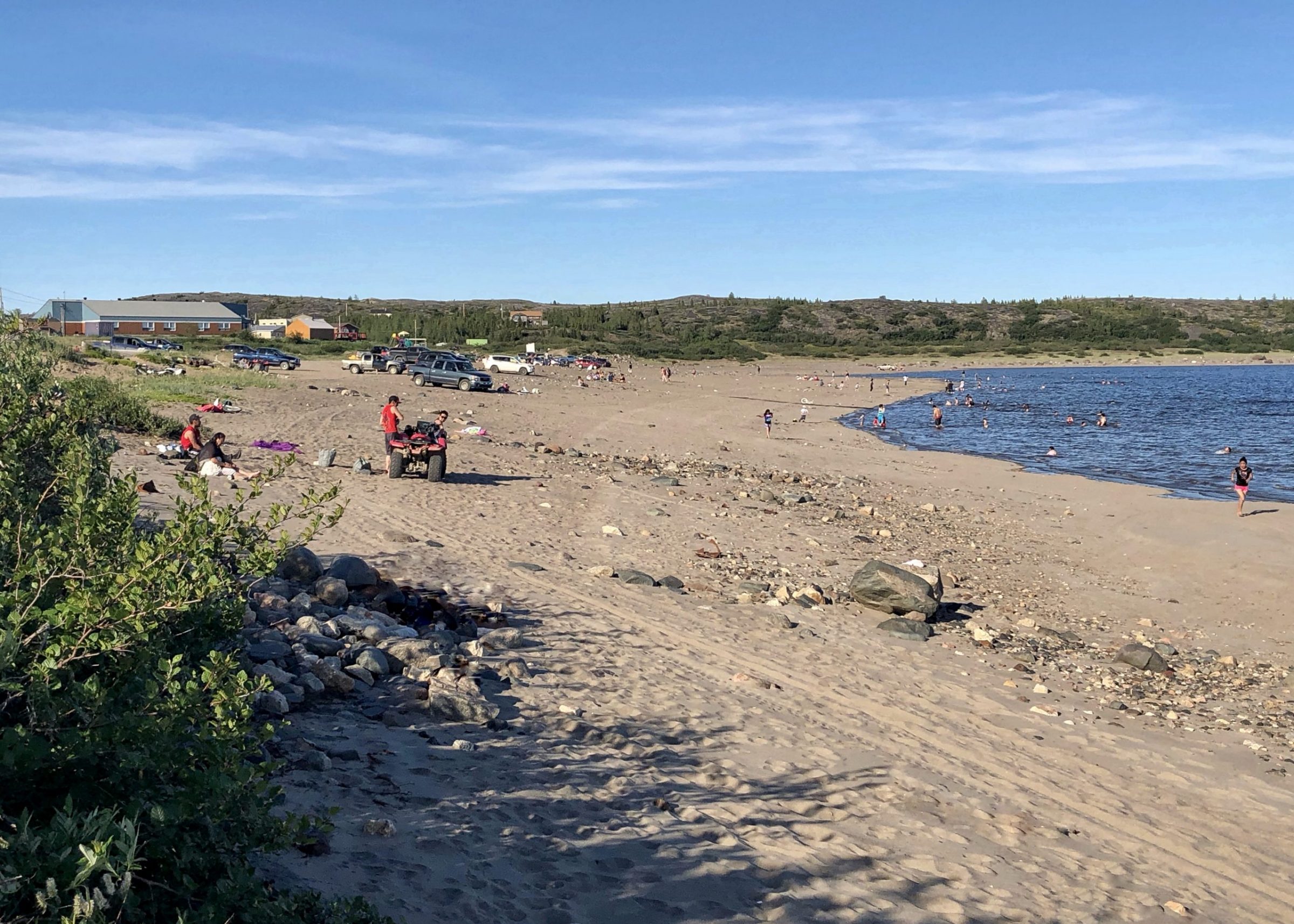 Kuujjuaq residents flock to the beach on Wednesday, July 15. It was a hot day, with temperatures reaching 28 degrees C. (Photo by Isabelle Dubois)